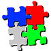 Zu sehen sind vier verbundene, andersfarbige Puzzleteile.
